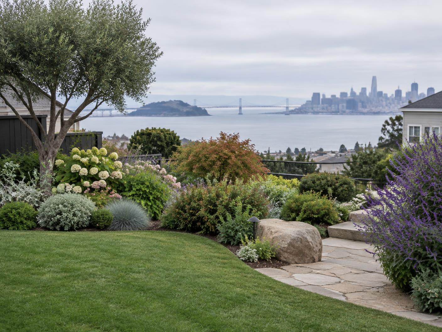 A maintained garden with layered planting and a view toward San Francisco